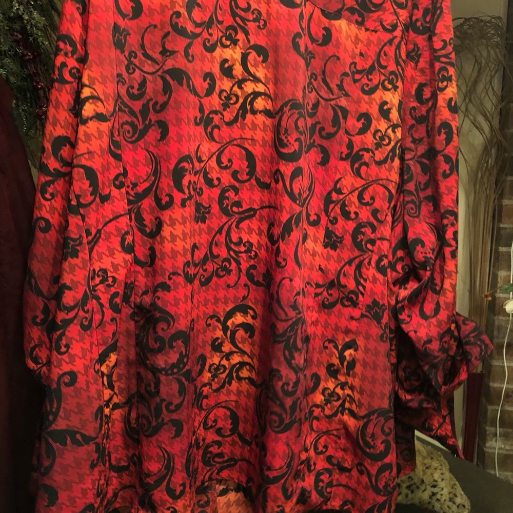 Catherine’s 5x button down shirt, red, black and orange.